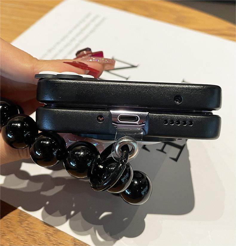 Cute Coal Ball Elf Phone Case, Hinge Leather Grain Case with Black Bead Bracelet, Compatible with Galaxy Z Flip 3/Galaxy Z Flip 4/Galaxy Z Flip 5/Galaxy Z Flip 6
