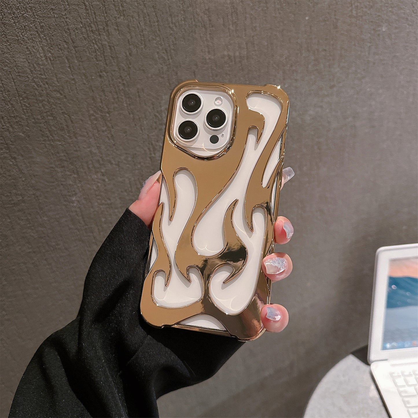 Fashionable electroplating hollow flame pattern anti-fall mobile phone case